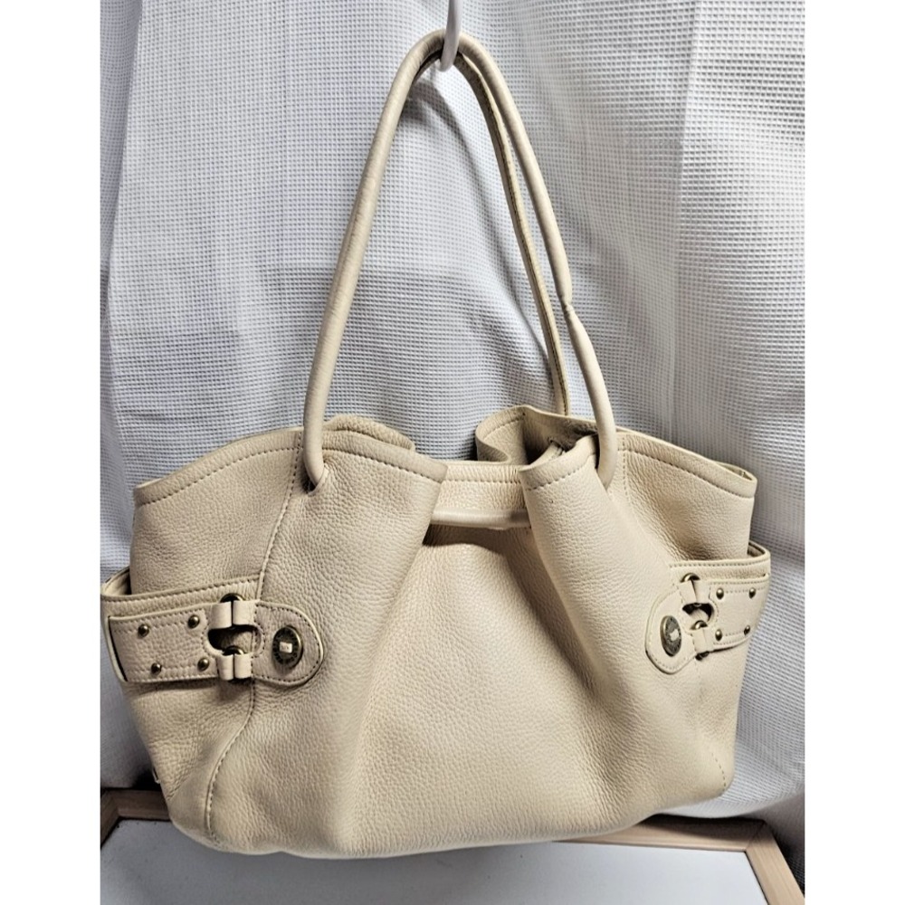 COLE HAAN cream pebbed leather side buckle double handles